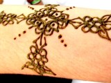 Henna body art - Cross
